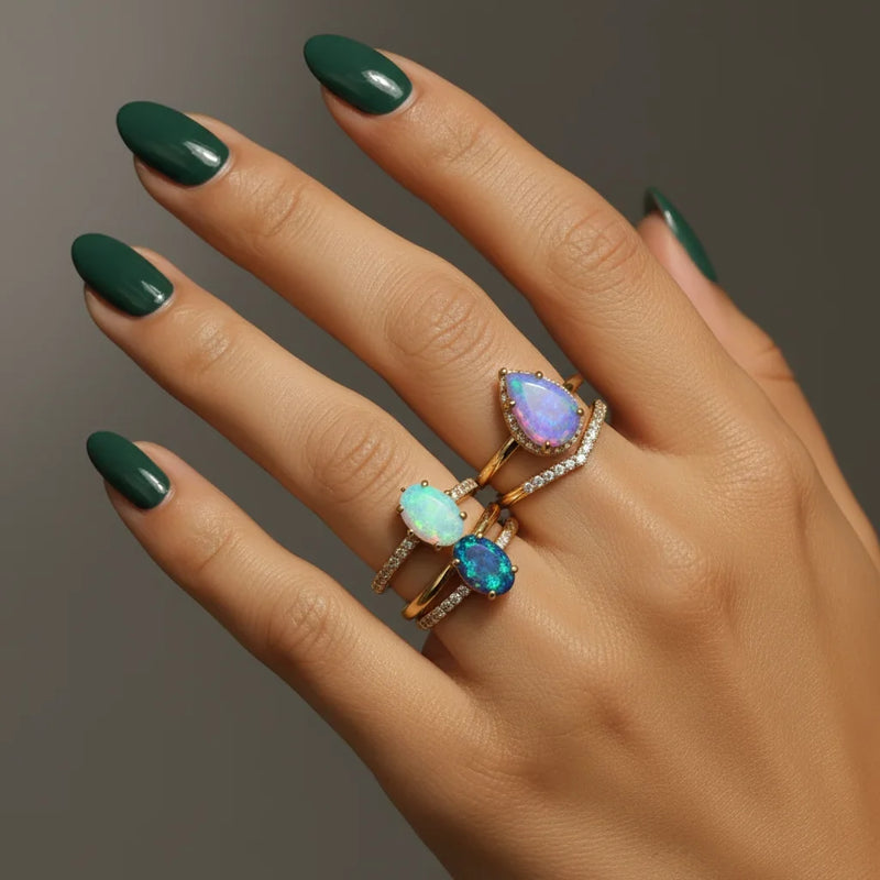 Natural opal rings in 925 sterling silver featuring white, blue and fire opal gemstones for women.